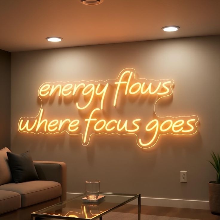 Energy flow where focus goes neon quotes