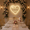 Romantic Banquet With Neon Heart Backdrop
